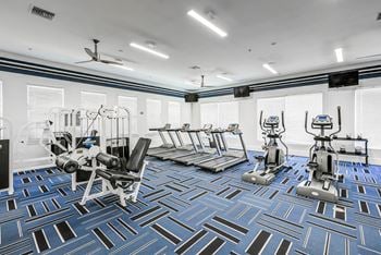 24 Hour fitness center with yoga room